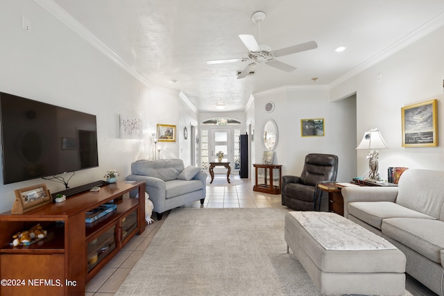 living room featuring crown molding, light tile flooring, and ceiling fan