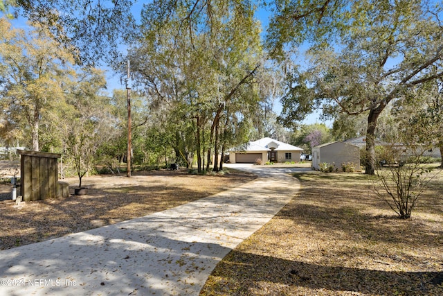 view of yard with a garage