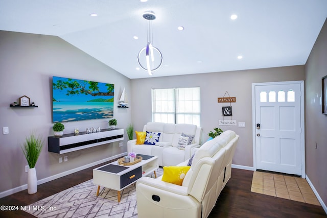 living room featuring hardwood / wood-style floors and lofted ceiling