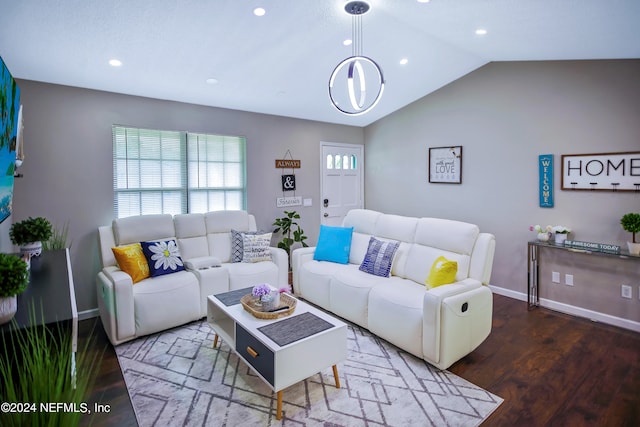 living room with wood-type flooring and lofted ceiling