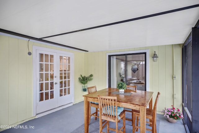 dining space featuring french doors