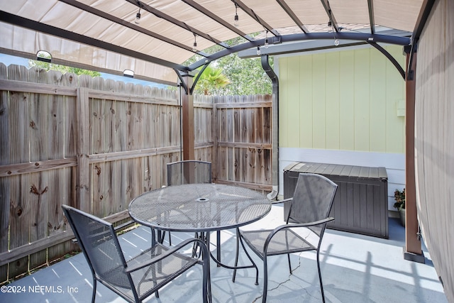 view of patio featuring a pergola