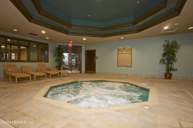 view of swimming pool featuring an indoor in ground hot tub