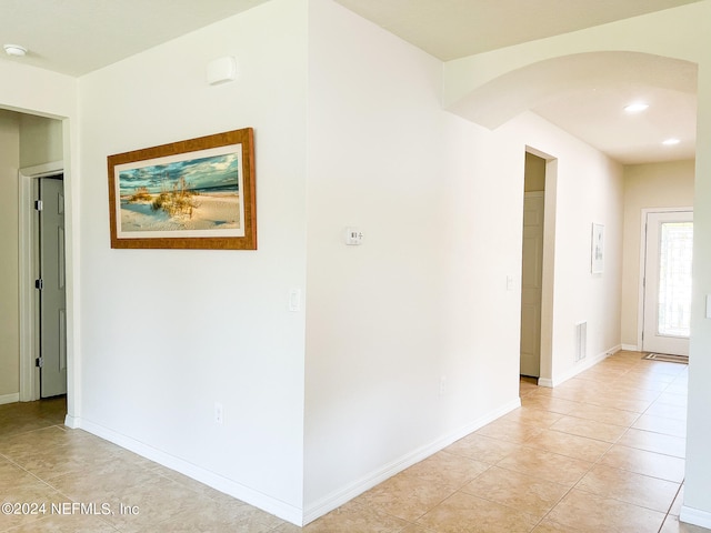 interior space featuring light tile patterned flooring