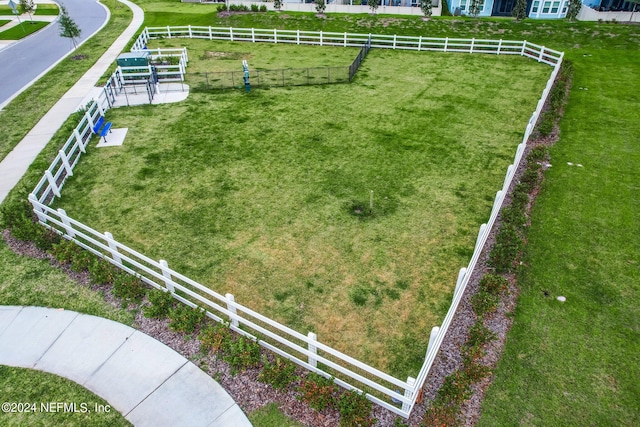 view of yard with a rural view