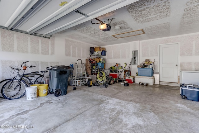 garage featuring a garage door opener