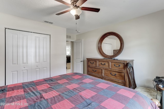 bedroom featuring a closet and ceiling fan