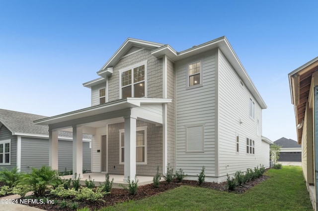 view of front of home with a front lawn