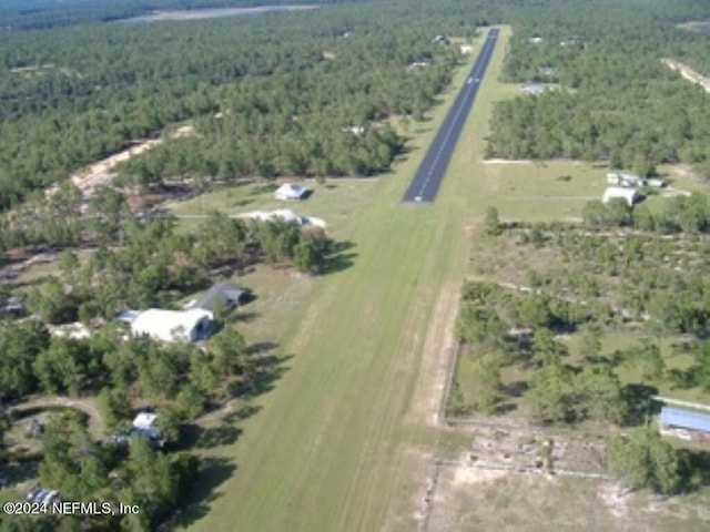 birds eye view of property with a rural view