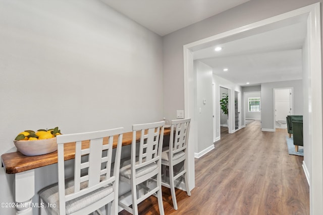 dining area featuring hardwood / wood-style floors