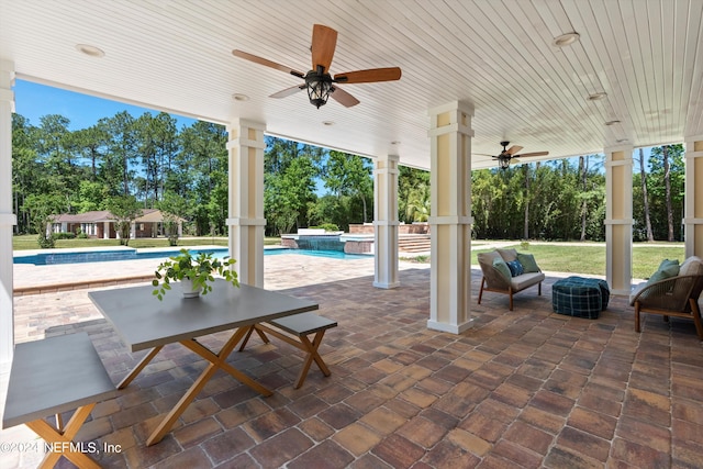 view of patio with ceiling fan and an outdoor hangout area