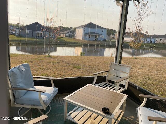 view of patio / terrace with a water view