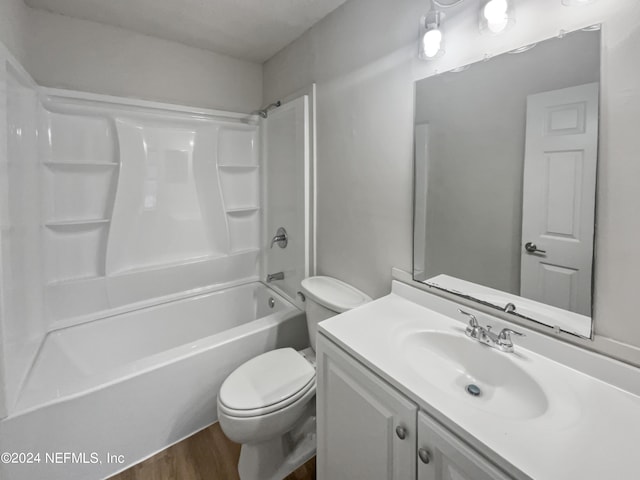 full bathroom featuring oversized vanity, shower / washtub combination, toilet, and hardwood / wood-style flooring