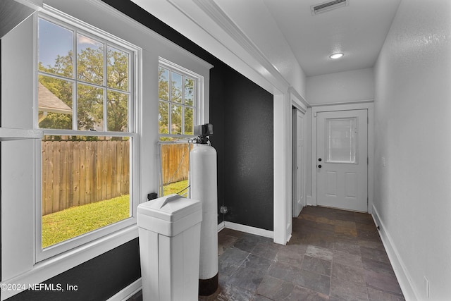 interior space with dark tile floors