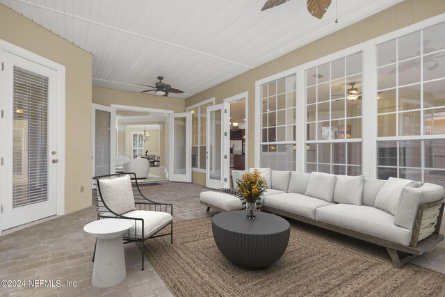 view of patio with ceiling fan and outdoor lounge area