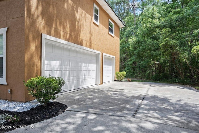 garage with driveway