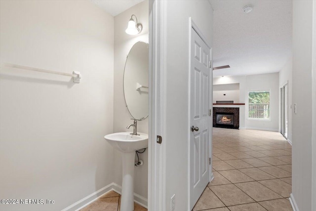 bathroom featuring tile patterned flooring and sink