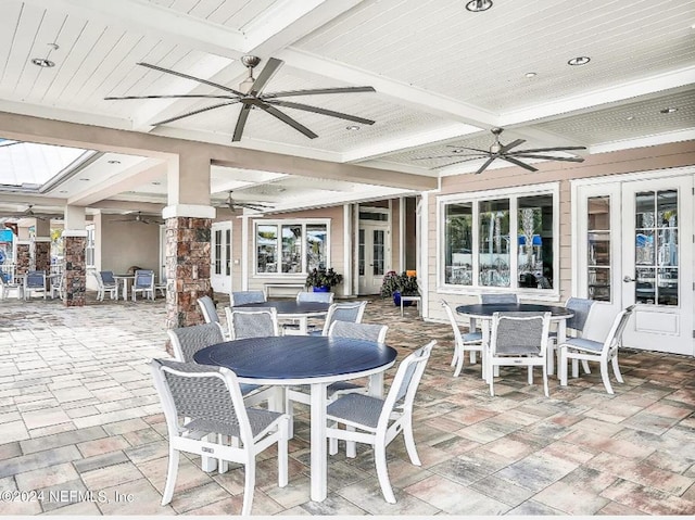 view of patio featuring french doors and ceiling fan