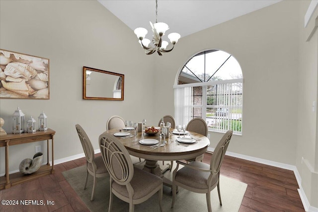 dining area featuring a notable chandelier, high vaulted ceiling, and dark hardwood / wood-style flooring