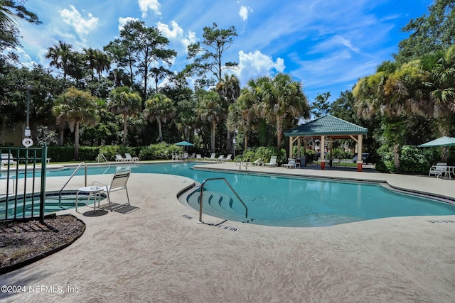 view of pool with a gazebo and a patio area