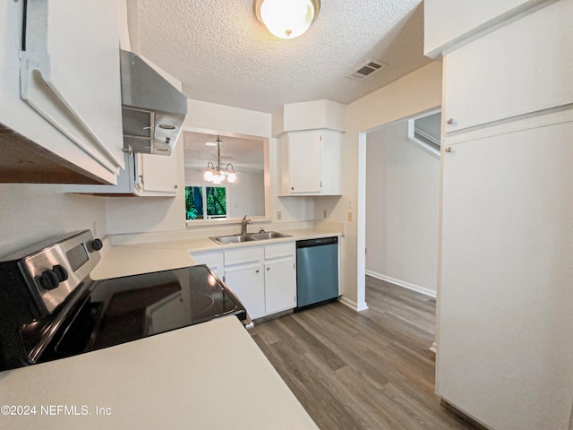 kitchen with white cabinets, appliances with stainless steel finishes, dark wood-type flooring, and sink