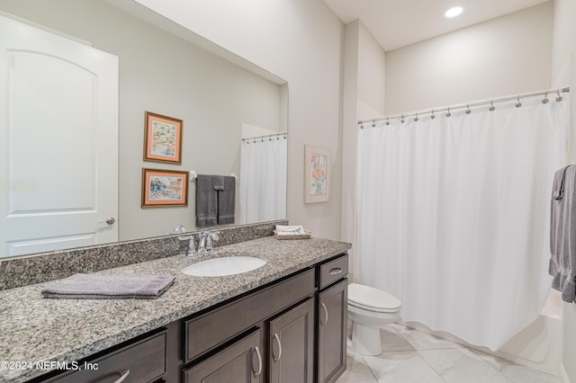 full bathroom with vanity, toilet, and shower / tub combo