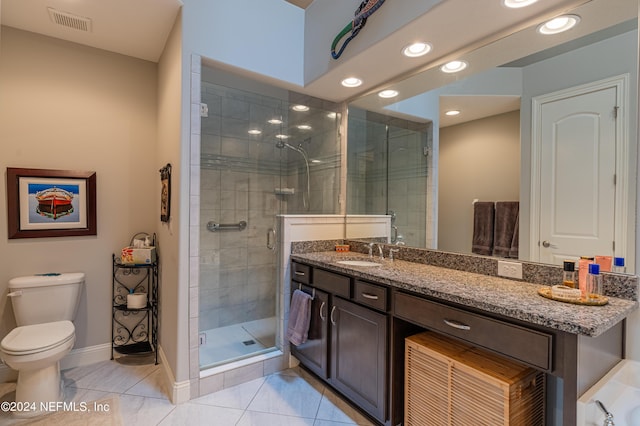 bathroom with vanity, an enclosed shower, tile patterned floors, and toilet