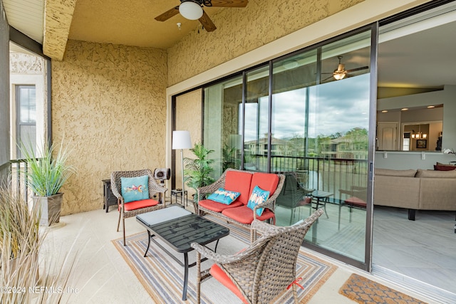 balcony featuring ceiling fan