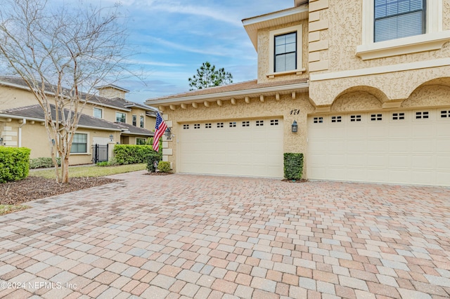 exterior space featuring a garage