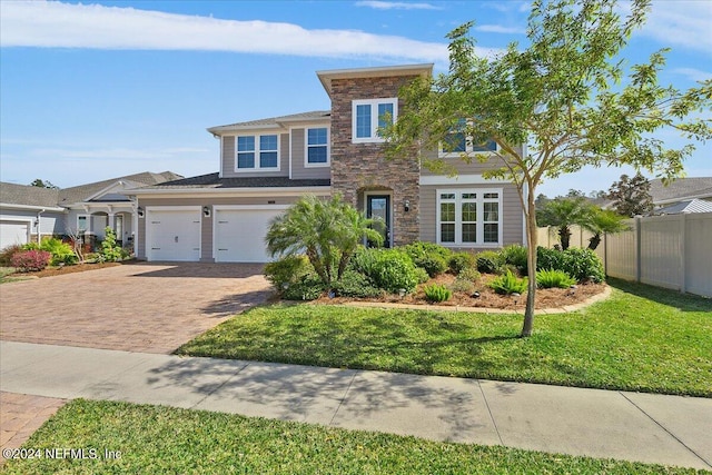 view of front of home featuring a front lawn