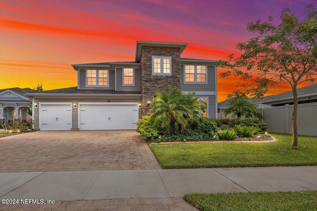 view of front of home featuring a yard