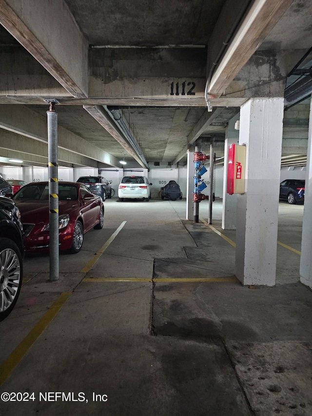 garage featuring a carport