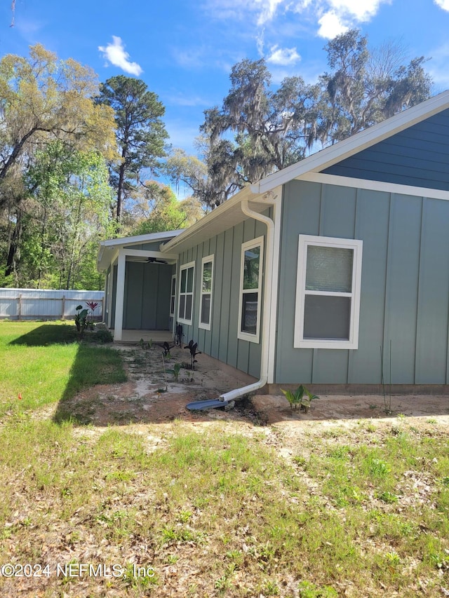 view of property exterior featuring a yard