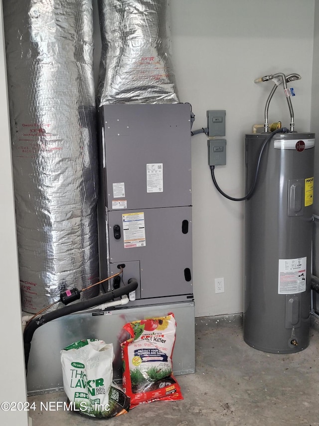 utility room featuring electric water heater