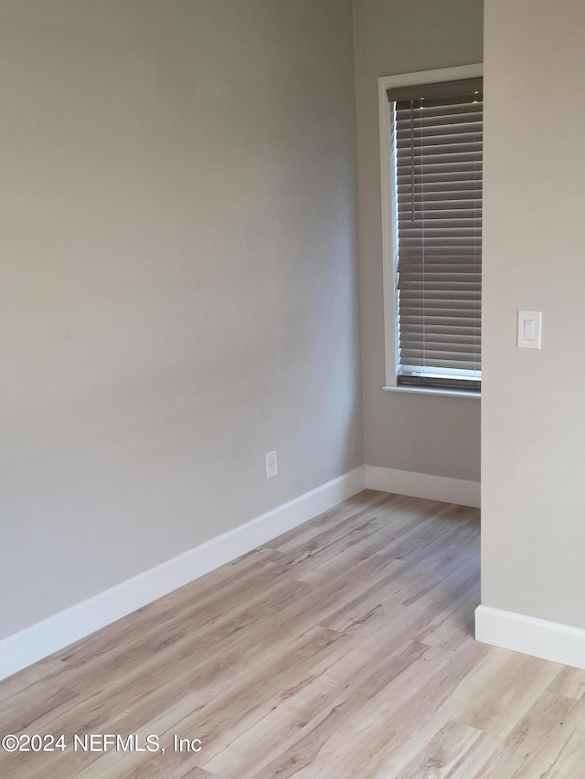 empty room featuring light hardwood / wood-style floors