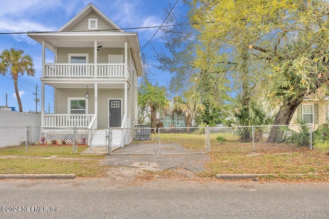 view of front of home with a balcony and a porch