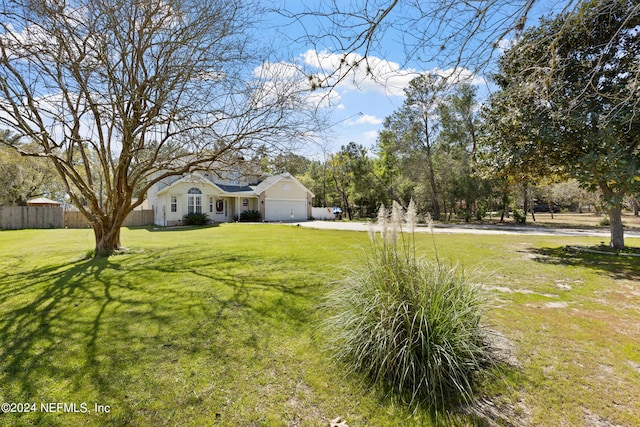 view of yard featuring a garage