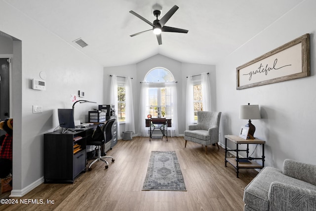 office with wood-type flooring, ceiling fan, and lofted ceiling