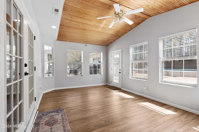 unfurnished sunroom featuring french doors, vaulted ceiling, wooden ceiling, and ceiling fan