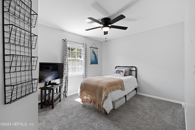 carpeted bedroom featuring ceiling fan