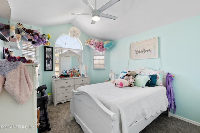 bedroom featuring ceiling fan and dark colored carpet