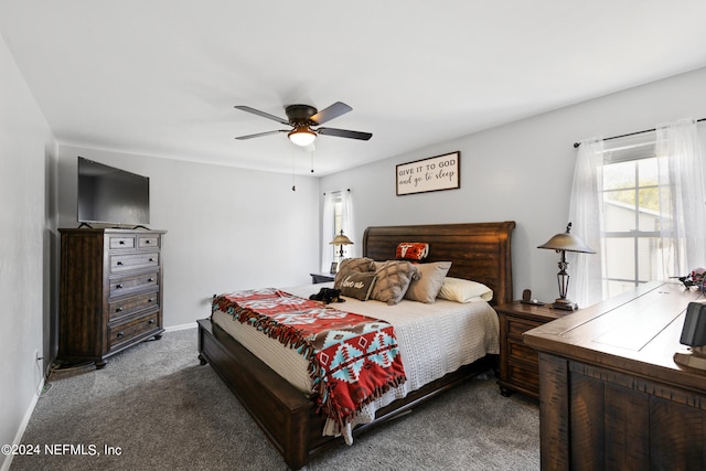 carpeted bedroom featuring ceiling fan