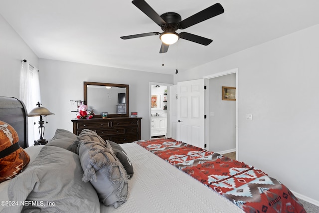 bedroom with connected bathroom and ceiling fan