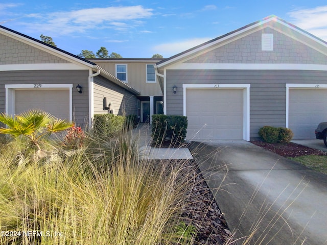 view of front of property featuring a garage