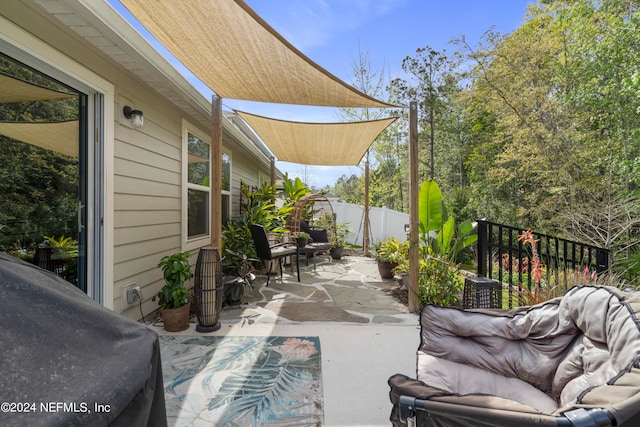 view of patio / terrace with fence