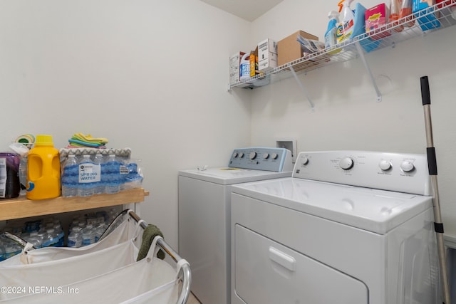 laundry area featuring laundry area and washing machine and clothes dryer