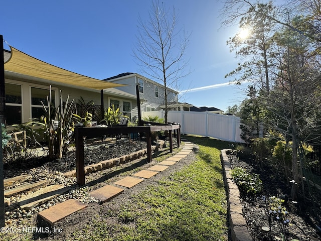 view of yard with fence