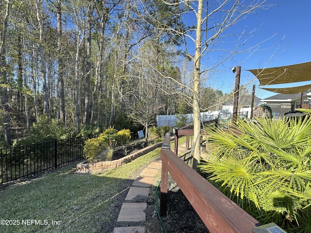 view of yard with fence