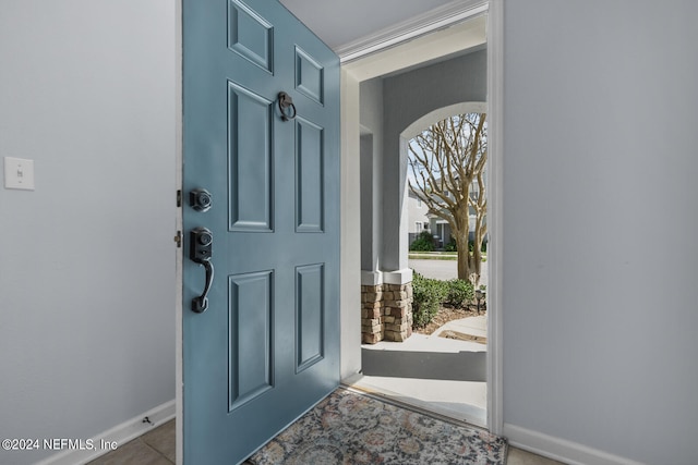 entrance foyer featuring tile patterned floors