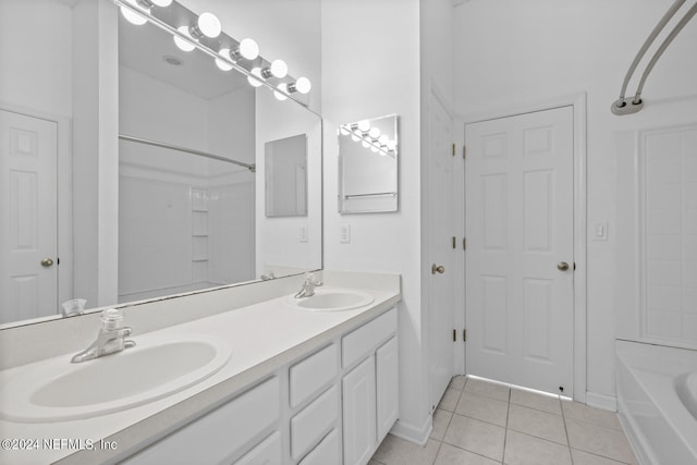 bathroom with vanity and tile patterned floors